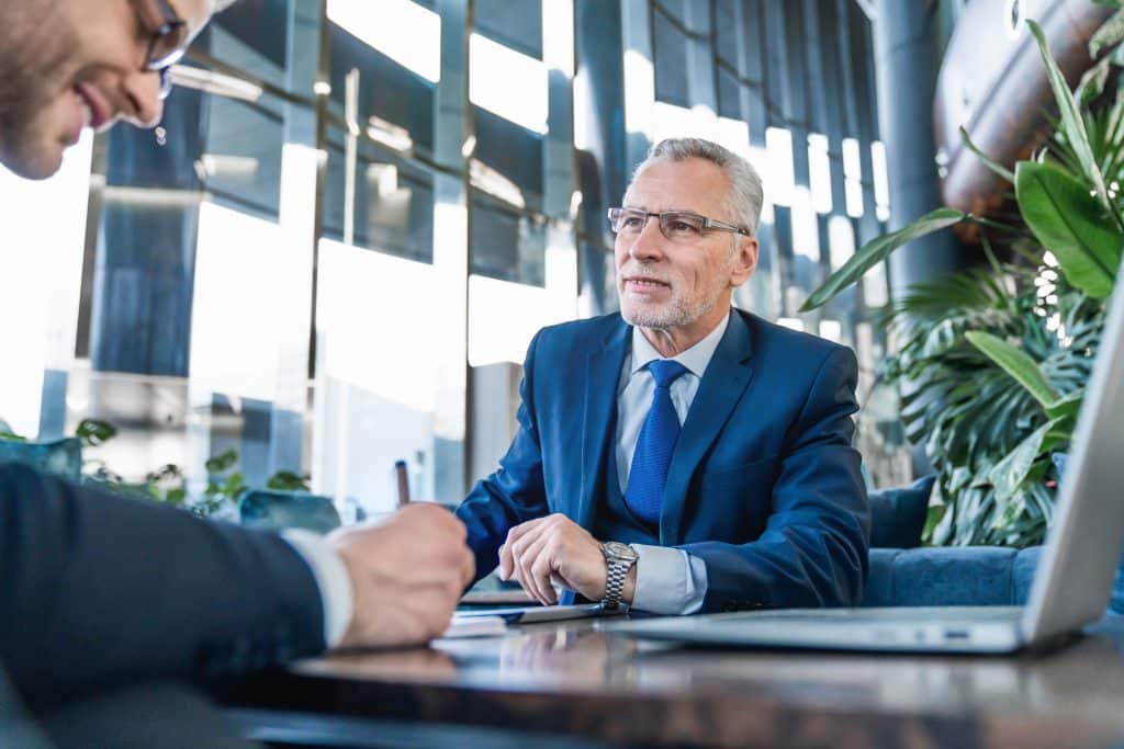 Business attorney meeting with client