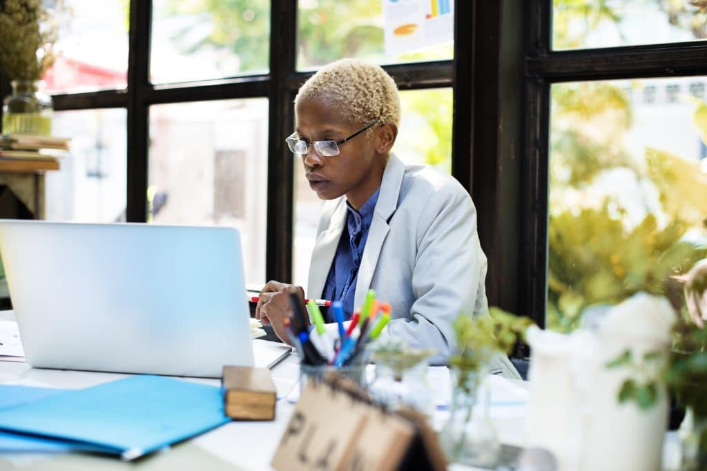 Focused doctor on laptop